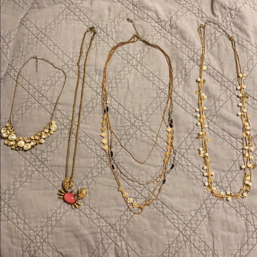 Lot of four gold fashion necklaces